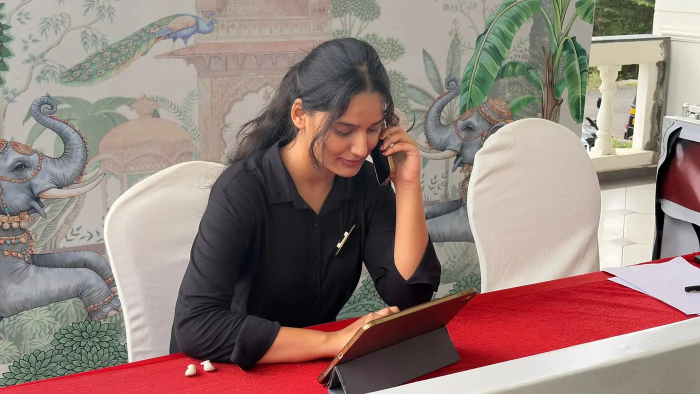 A TNP RSVP coordinator on a call with a guest
