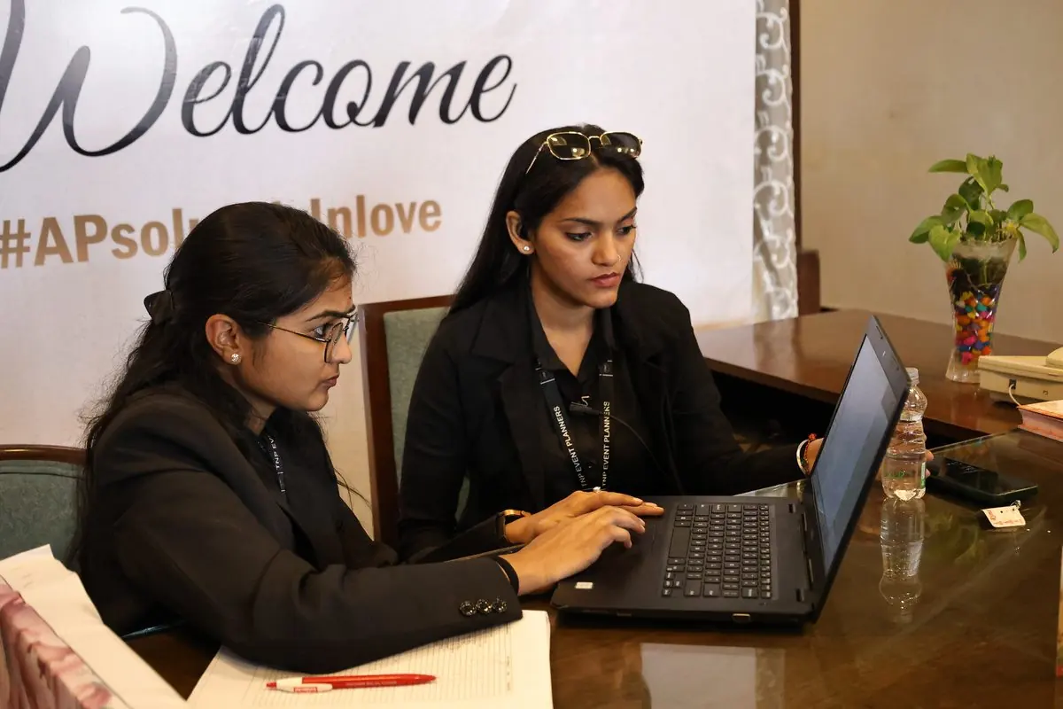 TNP team at a guest welcome desk