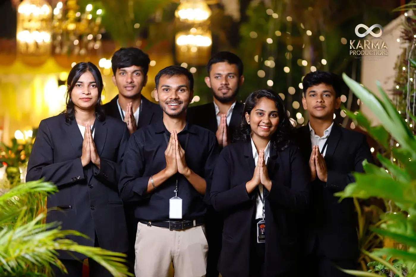 TNP team greeting guests with folded hands