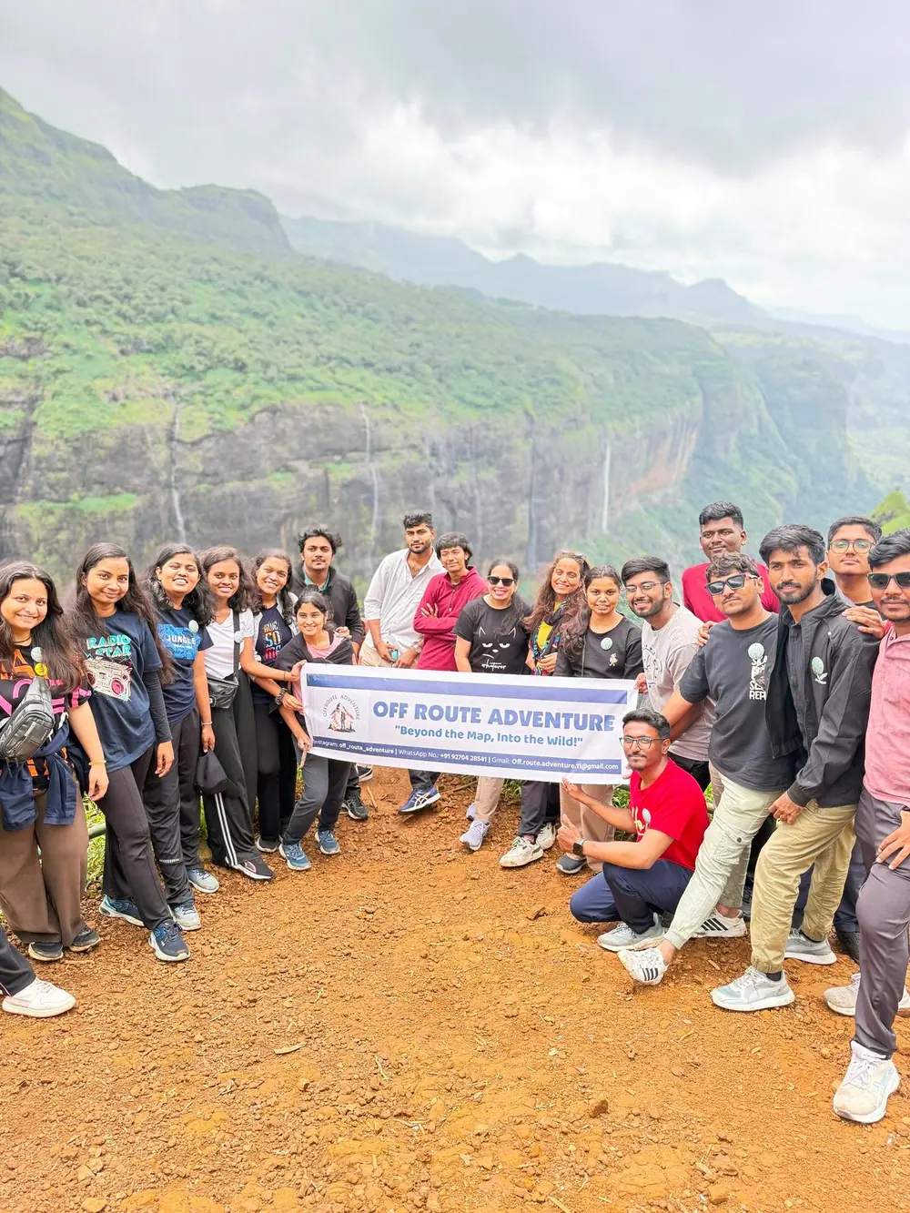 TNP team with trekkers on a hill trail